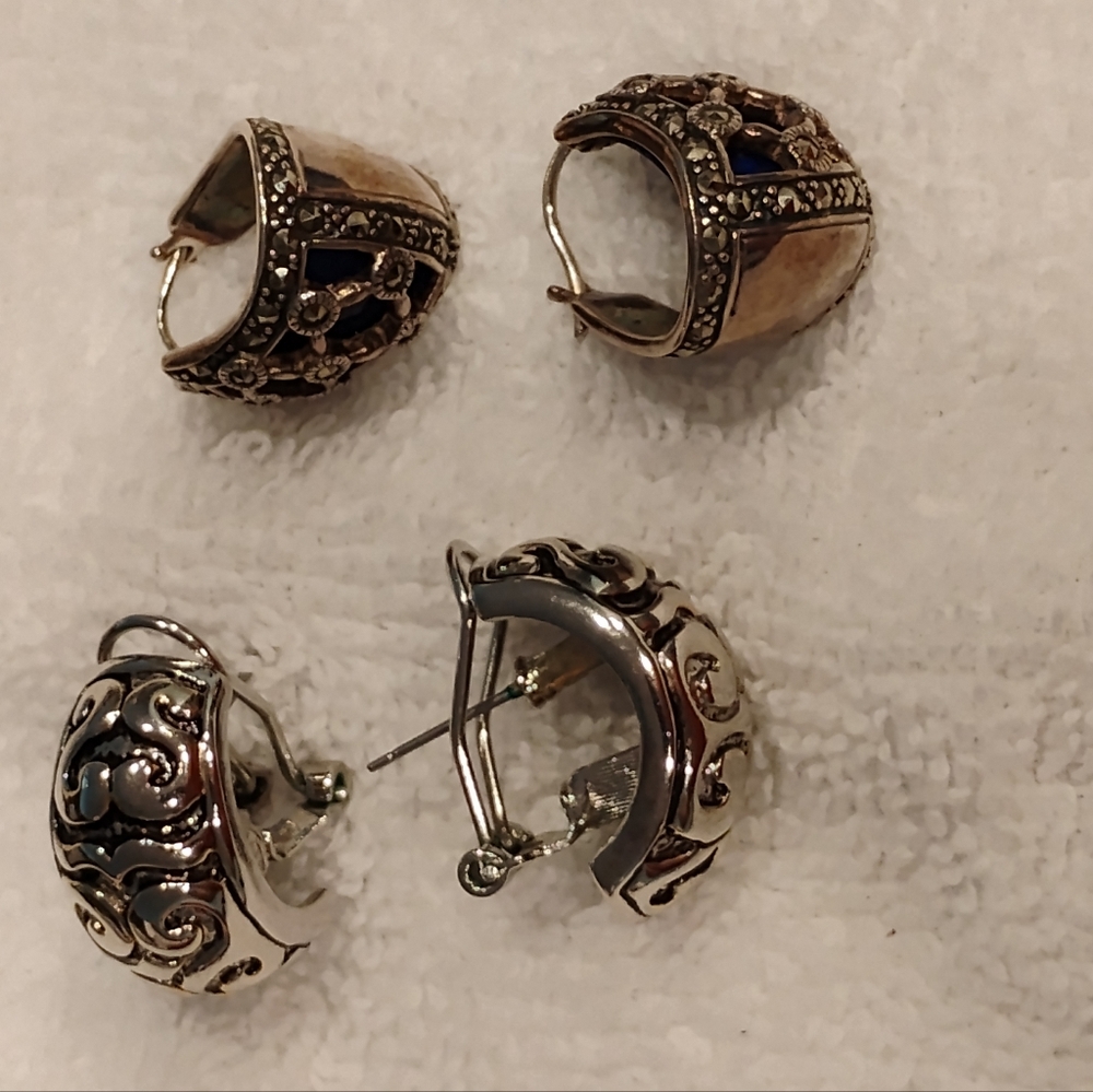 2 Pair Of Silver Pierced Earrings.